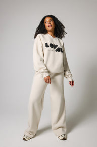 ALL SZN pantalon de jogging bio à jambes larges - Ecru