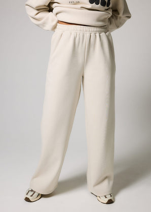 ALL SZN pantalon de jogging bio à jambes larges grande taille - Ecru