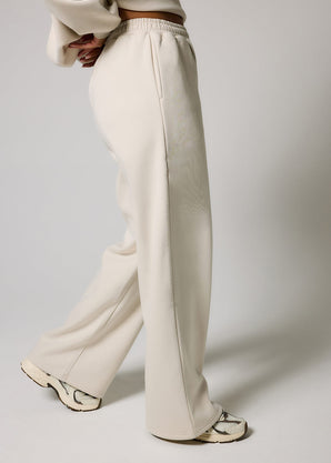 ALL SZN pantalon de jogging bio à jambes larges grande taille - Ecru