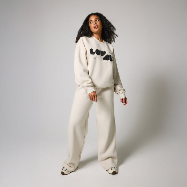 ALL SZN pantalon de jogging bio à jambes larges grande taille - Ecru